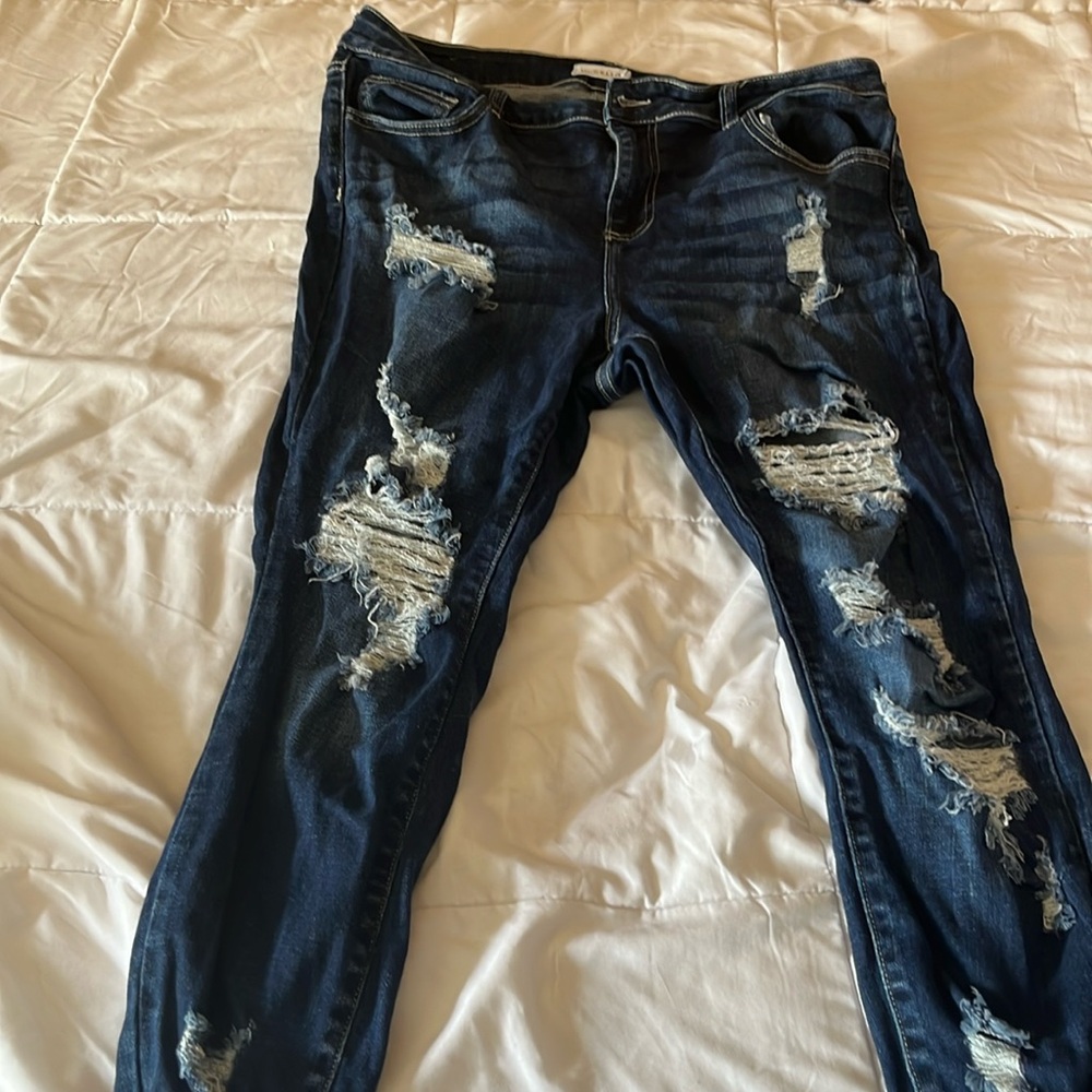 Ripped blue jeans